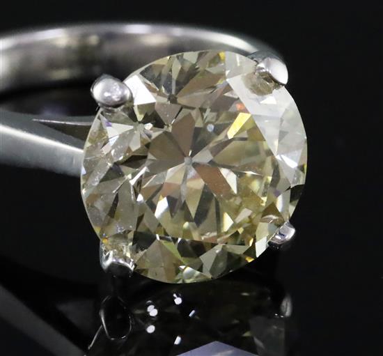 A 9ct white gold and solitaire diamond ring, the transitional cut stone weighing 7.06cts, size N.